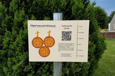 Schild mit Audiopunkt